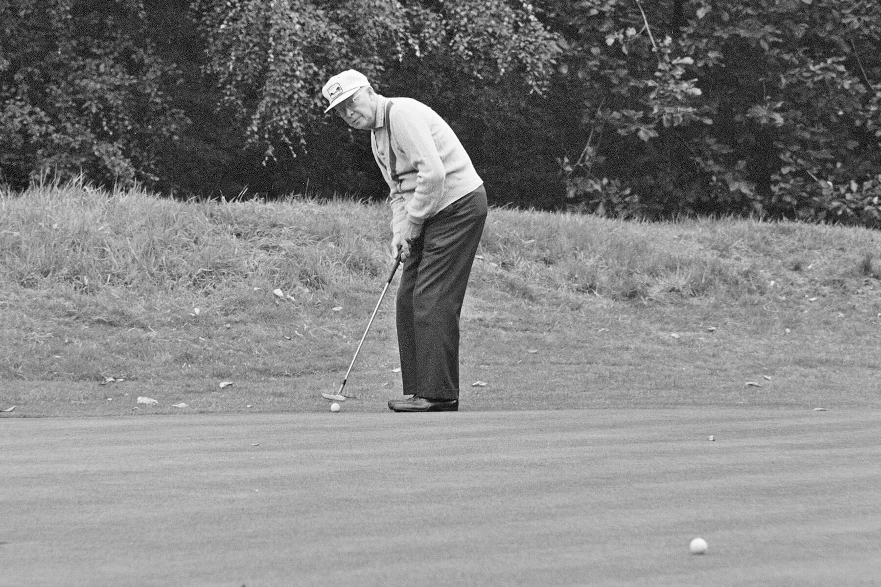 Dwight D. Eisenhower playing golf