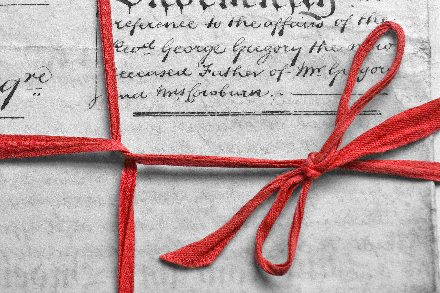 Documents with red ribbon