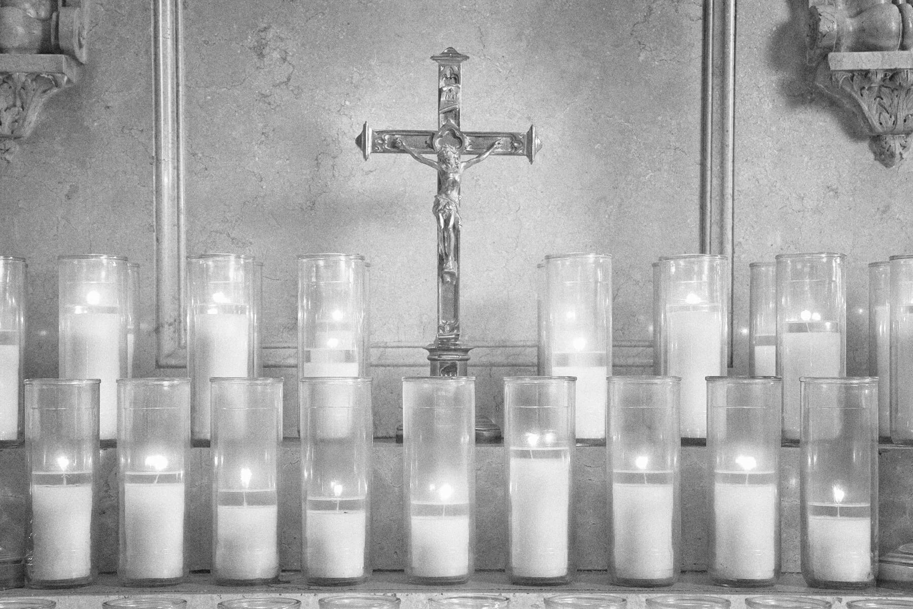 Prayer candles and crucifix