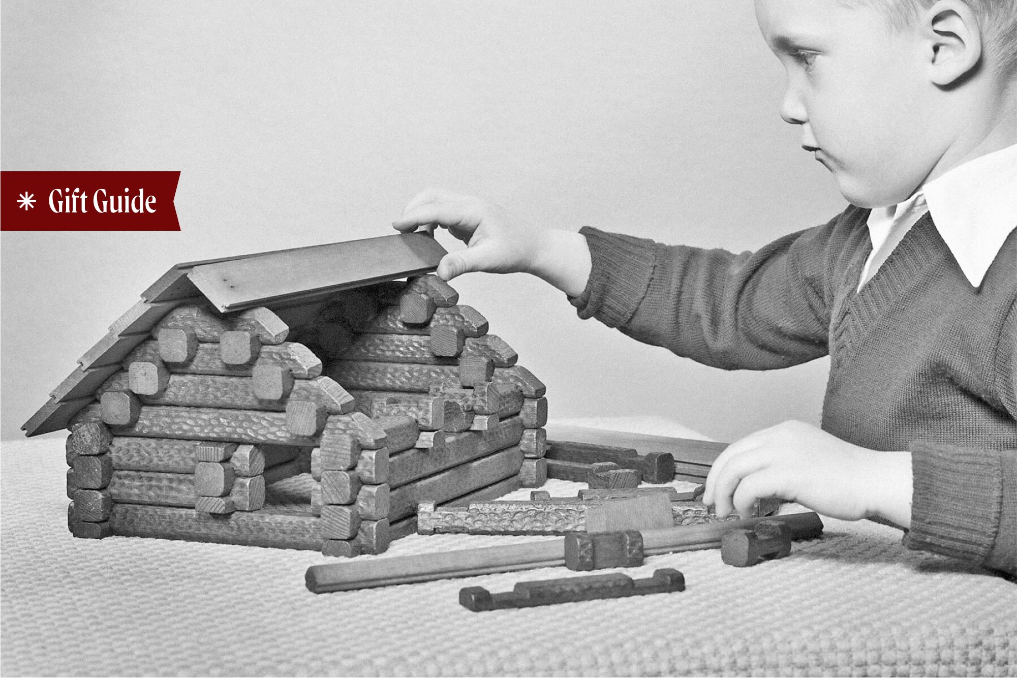 Boy with Lincoln Logs