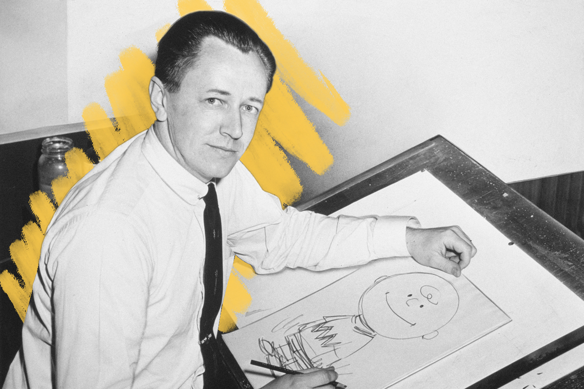 Charles Schulz with drawing of Charlie Brown