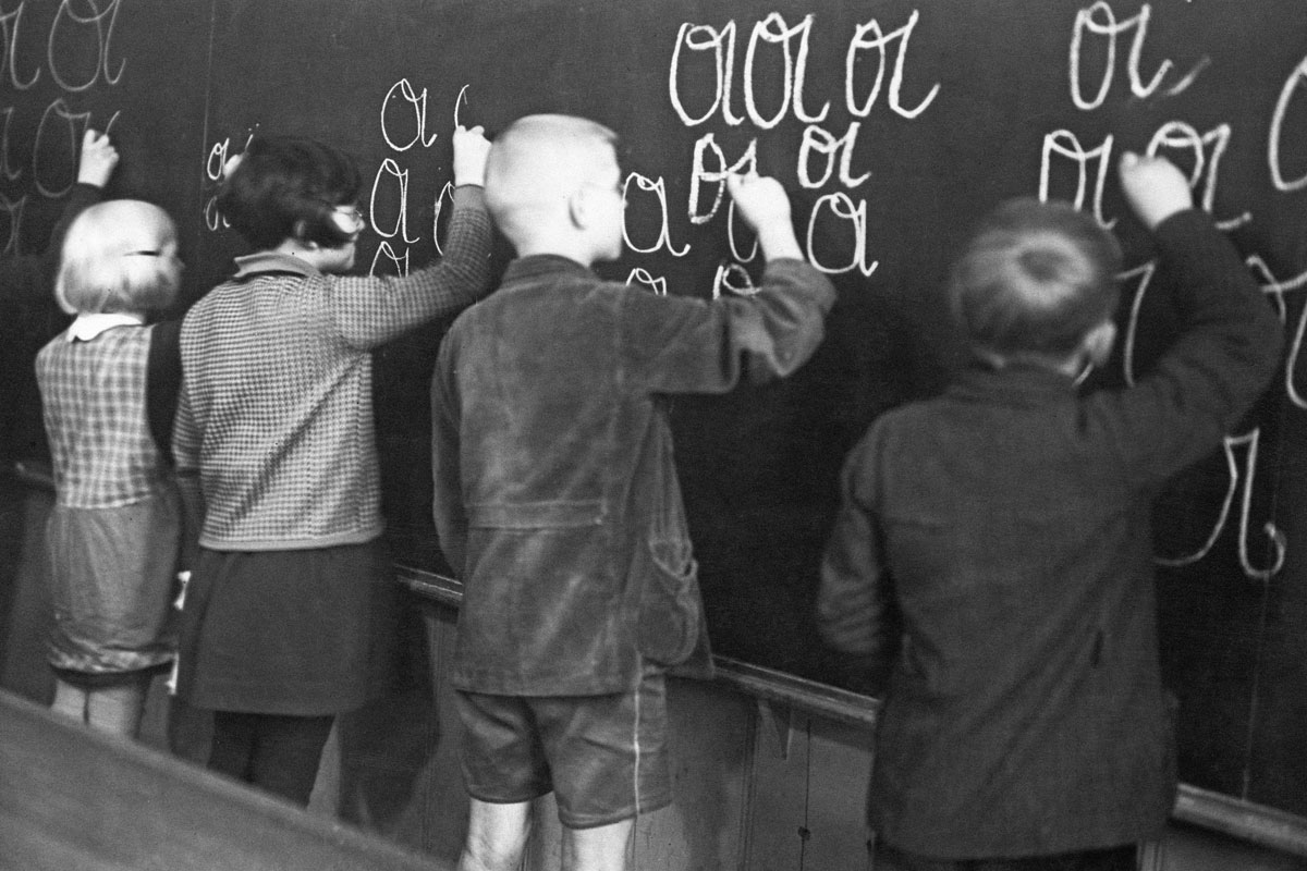 Kids writing in cursive